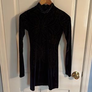 Free People XS Navy Blue Dress. Sheer where the pattern is.